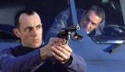 Jean Dupontel et Jean Dujardin, dans le film Le Convoyeur.