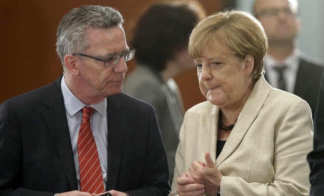 merkel maiziere migrants daech